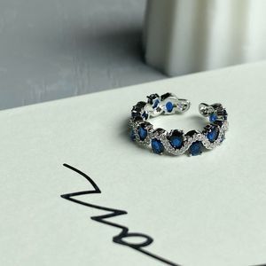 White Gold Plated Lab Sapphire Eternity Band